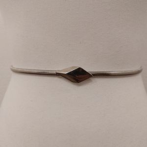Vintage Skinny Silver Tone Metal Coil Stretch Belt Made in USA